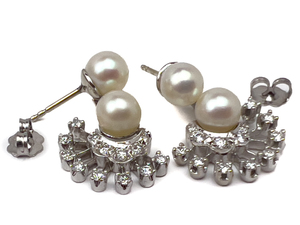 lot 12 image: One pair of 14k white gold custom dangle earrings with Akoya cultured pearls and diamond accents.  VALUE  $2000