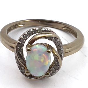 lot 63 image: YellOra Created Opal And Diamond Ring. Size 7 - 7.25.