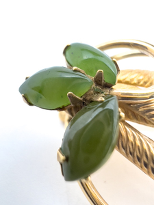 lot 191 image: Leafy Spray with three Jade stones, Unknown Maker, Hand-MadeYellow Base Metal Brooch.