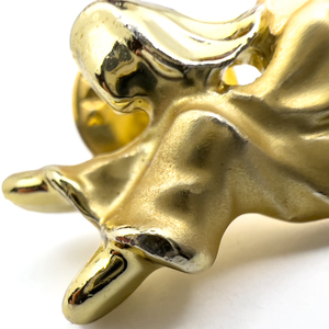lot 244 image: Gigi-Giusti, Angel Yellow Base Metal Lapel Pin.
