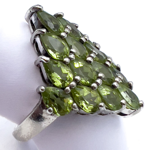 lot 182 image: Geometric cluster Unknown Maker, Peridot Sterling Silver Ring, Set With Peridot. Size 7 - 7.25.