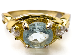 lot 238 image: Aquamarine and CZ, Yellow Base Metal Ring. Size 8 - 8.25.