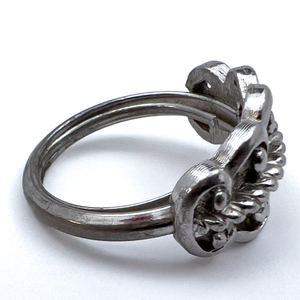 lot 239 image: AVON Ornate Open Work White Base Metal Ring. Size 5.5-7.