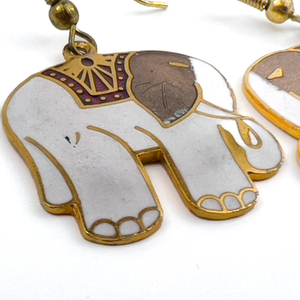 lot 219 image: Unknown Maker, White And Yellow Metal French Wire Earrings. Elephants With White And Red Enamel