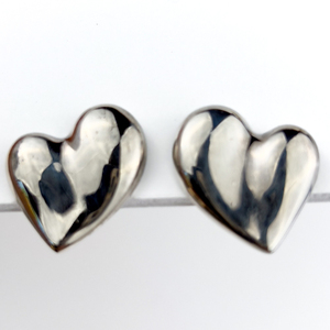 lot 222 image: Carolee, White Metal Clip-On Earrings. Puff Heart Button Design