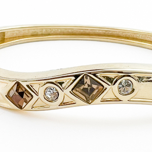 lot 176 image: Rhinestone set, Unknown Maker, Yellow Plated Base Metal Hinged Bangle. With Magnetic Catch.