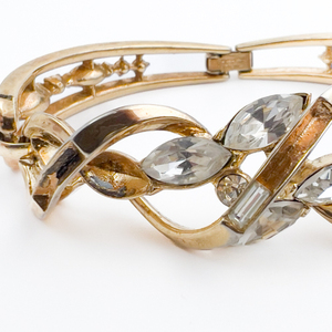 lot 223 image: Trifari Yellow Base Metal Bracelet. Set With Rhinestones