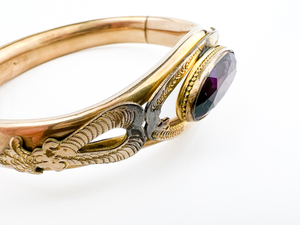 lot 226 image: Vintage Yellow Plated Base Metal Hinged Bangle. Oval Amethyst