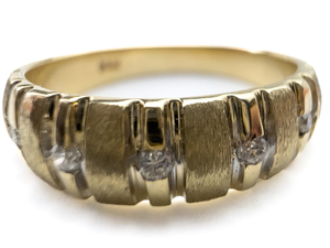 lot 5 image: 14k gold Diamond ring set with Five Diamonds. Size 8.5- 8.75