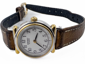 lot 21 image: Ladys Seiko 2Y00-0B19 yellow and white Quartz Analog watch. New Battery