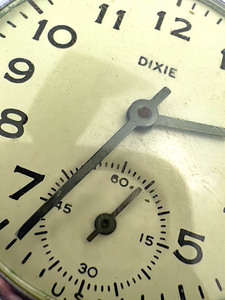 lot 26 image: Mens Dixie Open face Mechanical Pocket Watch. Working when wound.
