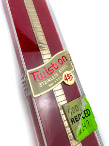 lot 31 image: Ladys Twist-on by Speidel, VINTAGE NOS Yellow stainless steel Stretch Watch Band