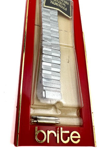lot 36 image: NOS Ladys Brite VINTAGE #B-86 White Stainless Steel Stretch Watch Band