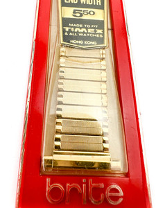 lot 43 image: NOS Brite VINTAGE PERPETUAL CALENDAR SHEET - #B-45 Yellow Stainless Steel Stretch Watch Band .