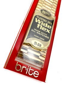 lot 47 image: NOS Mens Brite Wide-Flex, VINTAGE #B-59 Yellow stainless steel Stretch Watch Band .