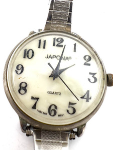 lot 95 image: Ladys White Pearlescent dial Japona C-004 white Quartz Analog watch. NOT WORKING