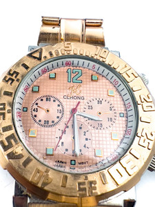 lot 104 image: Mens CLHONG Pink dial rose plated stainless steel and base metal Quartz Analog watch. New Battery