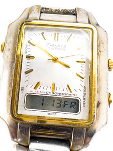 lot 112 image: Mens Bulova Caravelle C860248 yellow and white DigitalAnalog Watch. working