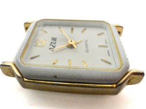 lot 119 image: Ladys AZUR White Dial and Bezel yellow Quartz Analog watch. New Battery