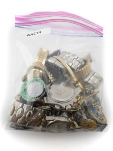 lot 138 image: Bag of miscellaneous parts, bands etc.