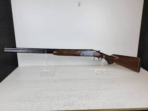 lot 571 image: Savage 330 12 Gauge Shotgun