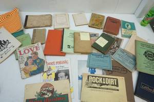 Group of Old Books, Music, and Papers