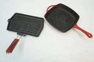 2 Cast Iron flatware