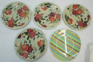 4 plates with Apples