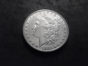 lot 9 image: 1884 Morgan Silver Dollar