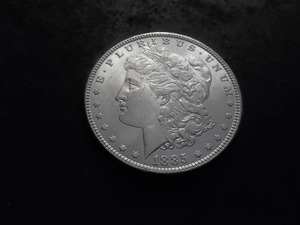 lot 12 image: 1885 Morgan Silver Dollar
