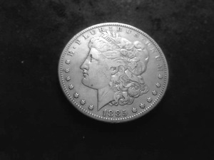 lot 14 image: 1885 S Morgan Silver Dollar