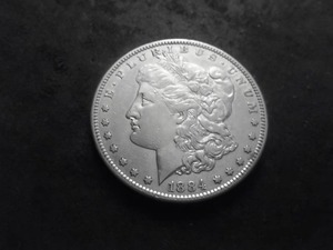lot 15 image: 1884 S Morgan Silver Dollar