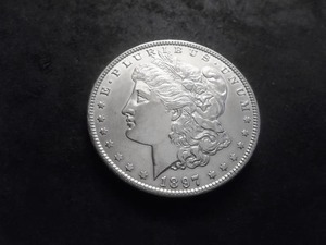 lot 28 image: 1897 O Morgan Silver Dollar