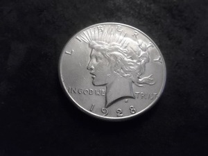 lot 48 image: 1928 S Peace Silver Dollar