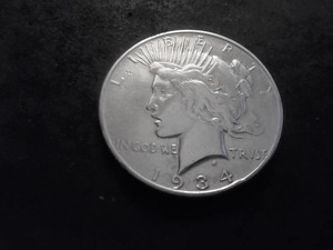lot 49 image: 1934 D Peace Silver Dollar