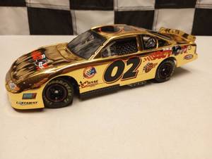 lot 37 image: Action Elite 2002 Gold Prototype #02 10th Anniversary124th Scale Die Cast Car
