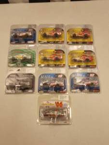 lot 82 image: Action 164th Scale Die Cast Cars