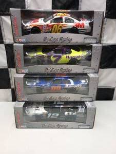 lot 132 image: Team Caliber Pit Stop 124th Scale Die Cast Cars