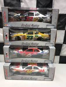 lot 133 image: Team Caliber Pit Stop 124th Scale Die Cast Cars