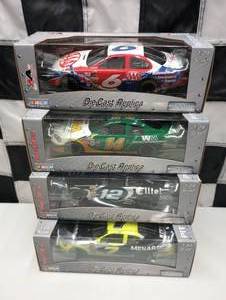 lot 134 image: Team Caliber Pit Stop 124th Scale Die Cast Cars
