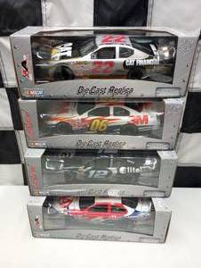 lot 137 image: Team Caliber Pit Stop 124th Scale Die Cast Cars