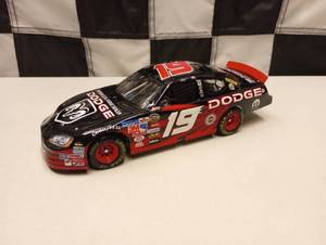 lot 155 image: Action Elite Jeremy Mayfield #19 Dodge Dealers  Reverse Paint 124th Scale Die Cast Car