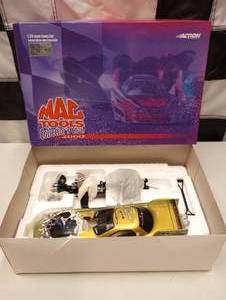 lot 218 image: Action Mac Tools Jerry Toliver WWF  The Rock 124th Scale Funny Car Die Cast