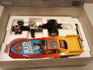 lot 220 image: Action Mac Tools John Force #1 Castrol  Superman 124th Scale Funny Car Die Cast