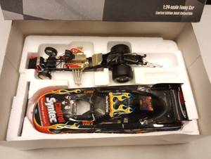 lot 237 image: Action Mac Tools Tony Pedregon Castrol Syntec  Kiss 124th Scale Funny Car Die Cast