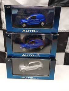 lot 240 image: Autoart 143rd Scale Die Cast Cars