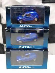lot 241 image: Autoart Chrysler Panel Cruisers143rd Scale Die Cast Cars