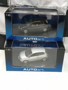 lot 246 image: Autoart Volkswagen Polo 143rd Scale Die Cast Cars