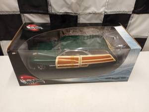 lot 264 image: Hot Wheels 1950 Merc Woodie 118th Scale Die Cast Car