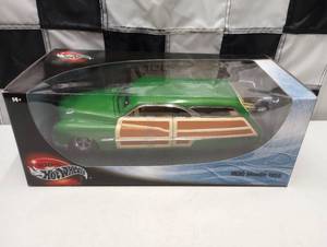 lot 265 image: Hot Wheels 1950 Merc Woodie 118th Scale Die Cast Car